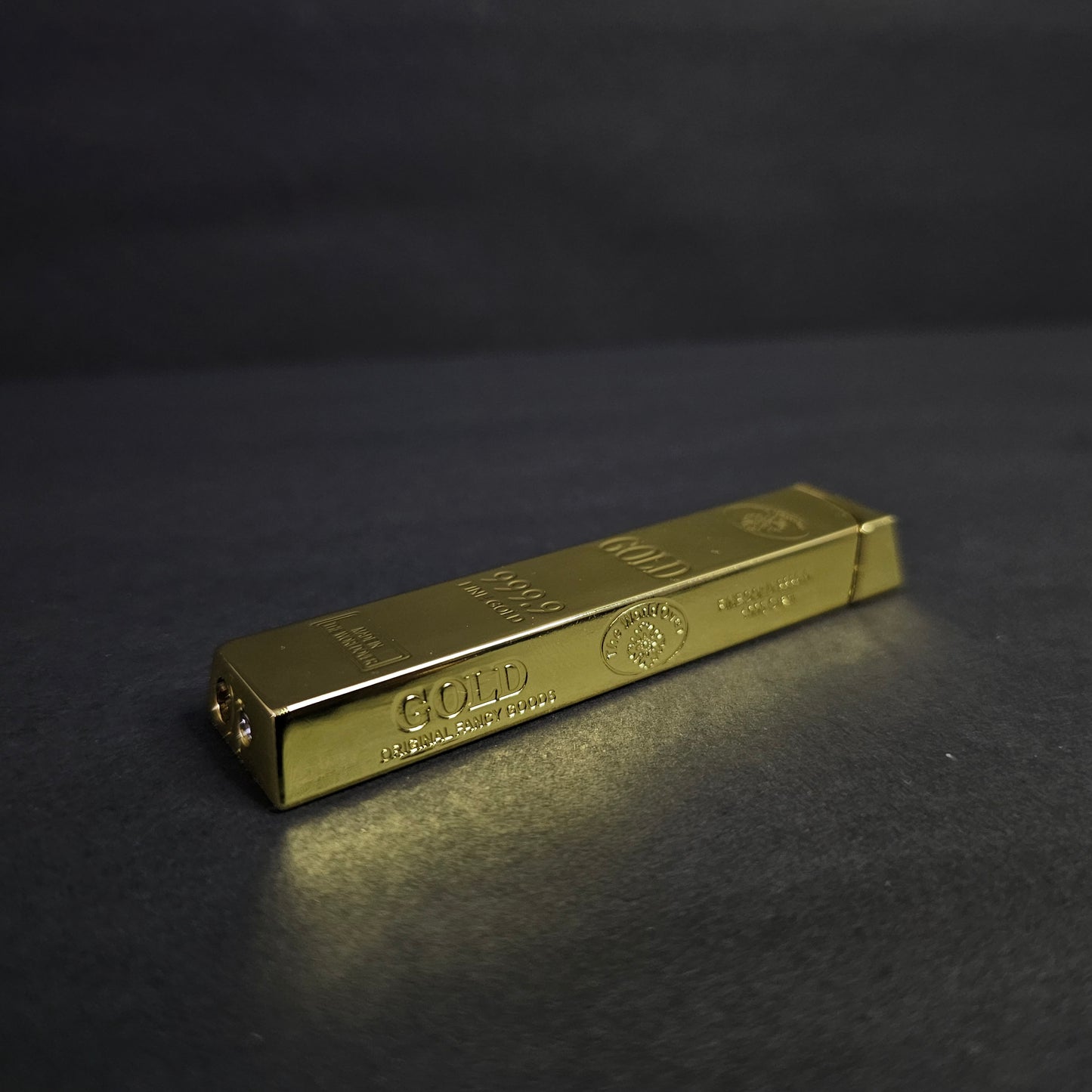 Gilded Glamour: The Gold Bar Lighter